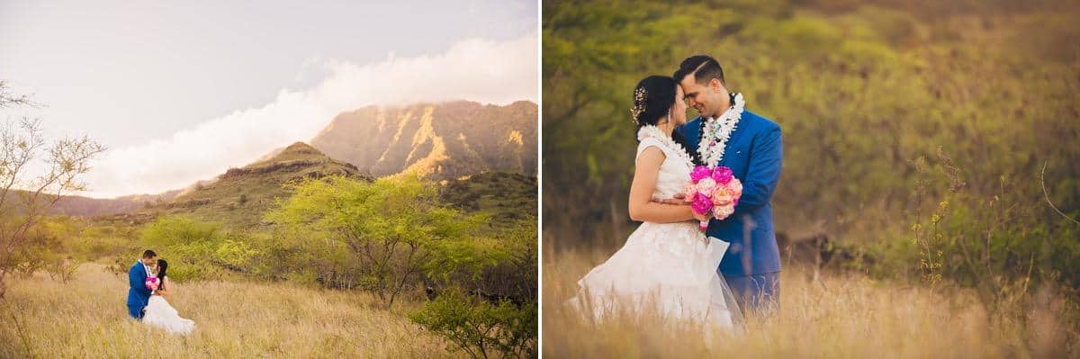 Bride and groom standing in long grass with mountains behind them Hawaii Destination wedding photographer www.benandhopeweddings.com.au
