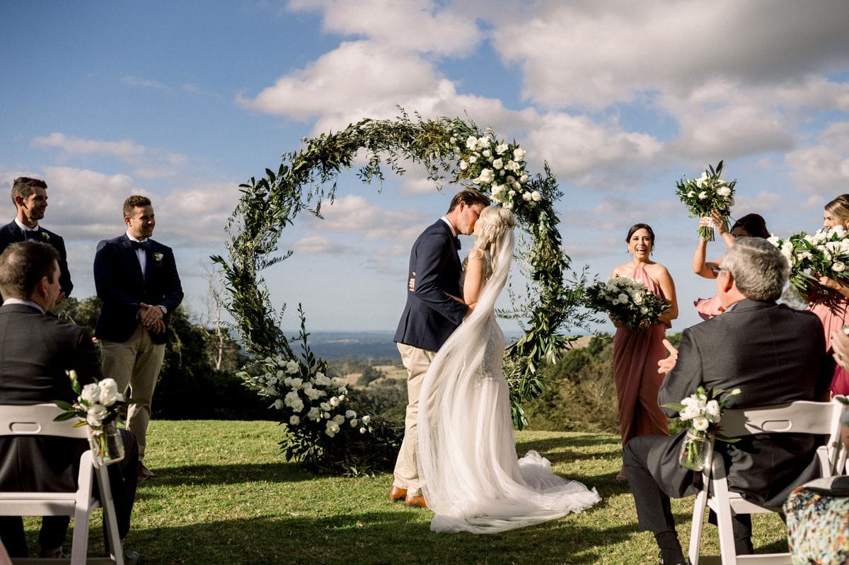 Maleny Manor Wedding photographer sunshine coast ceremony outdoors country first kiss