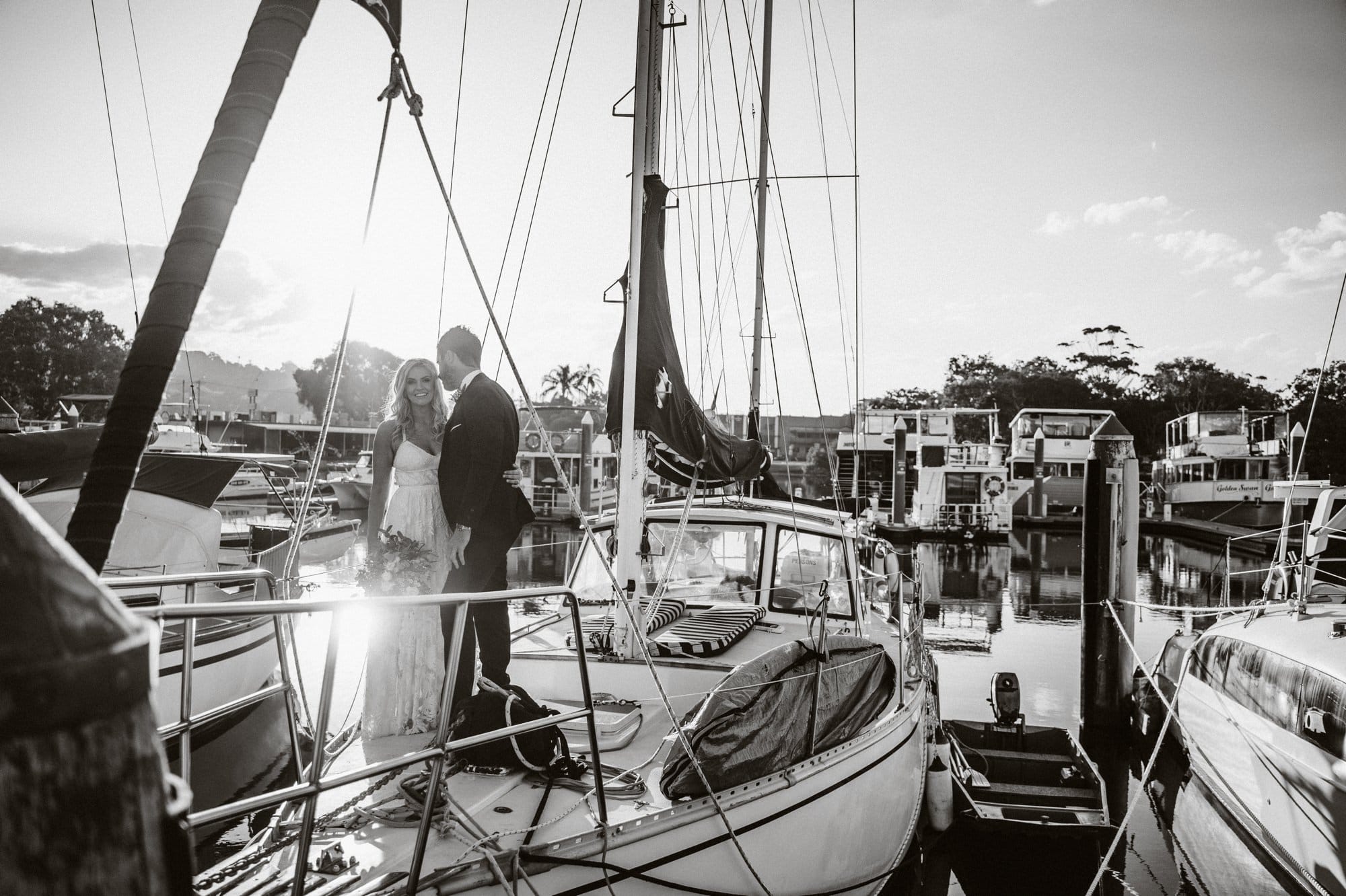 bride and groom on a boat gold coast www.benandhopeweddings.com.au