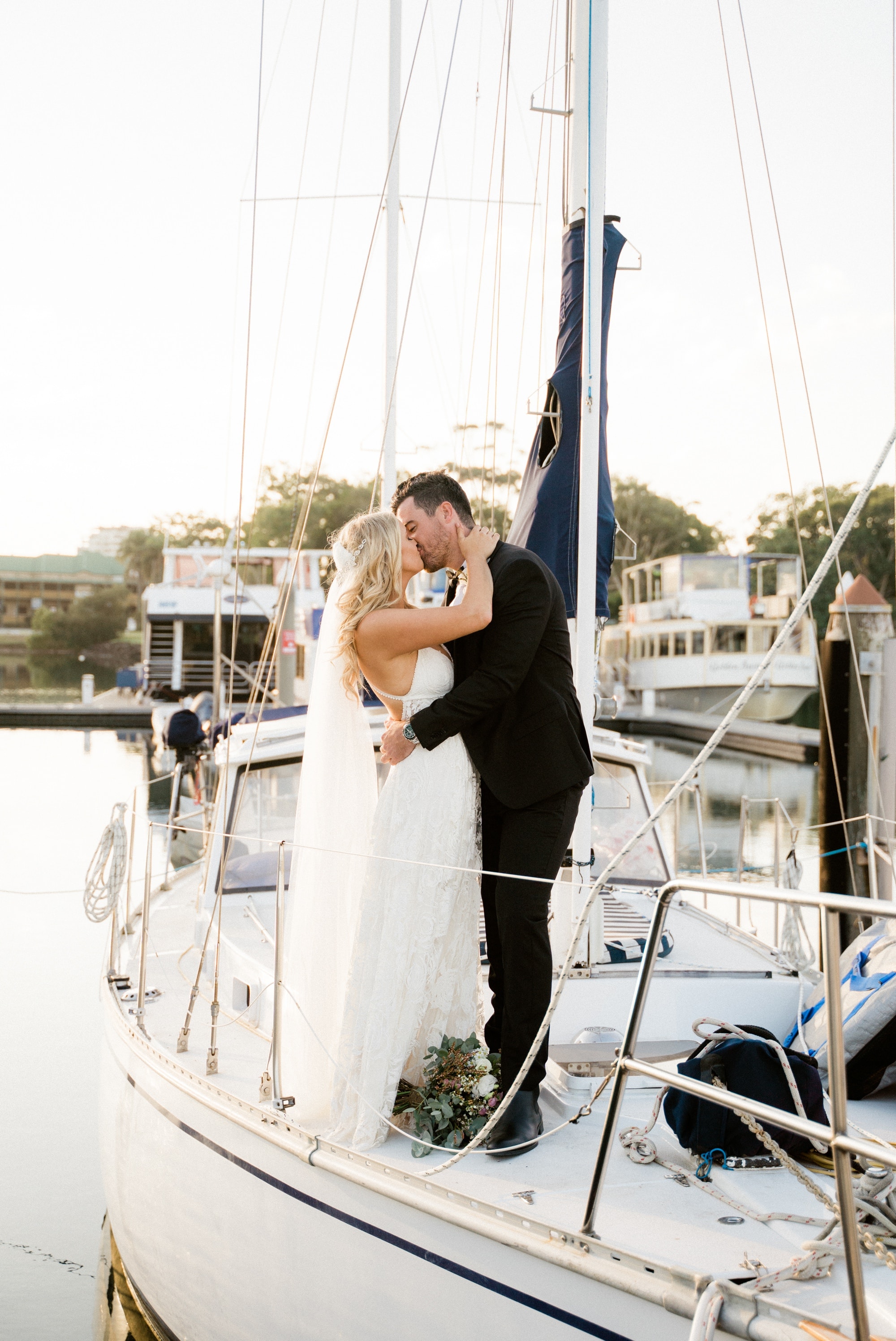 bride and groom on a boat wedding gold coast www.benandhopeweddings.com.au