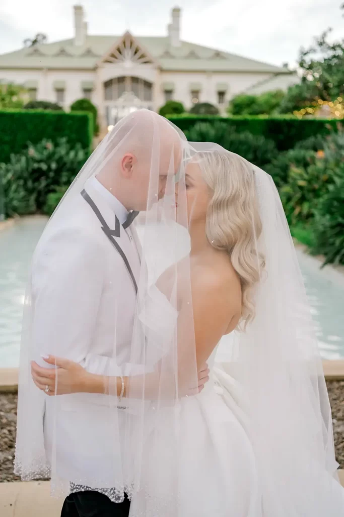 Bride and groom under veil wedding intercontinental sanctuary cove